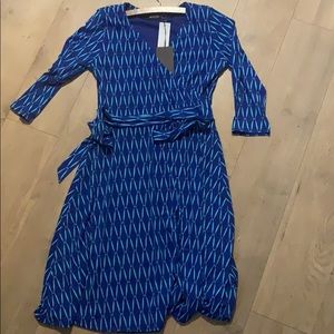 Never worn. Blue/Teal dress